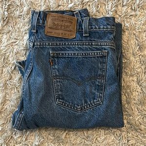 Vintage 505 Levi 32-30, someone tried to add belle bottoms so seam is ripped.